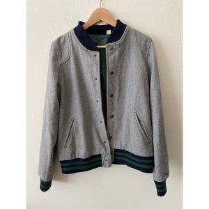 Gray bomber jacket. Dark trim